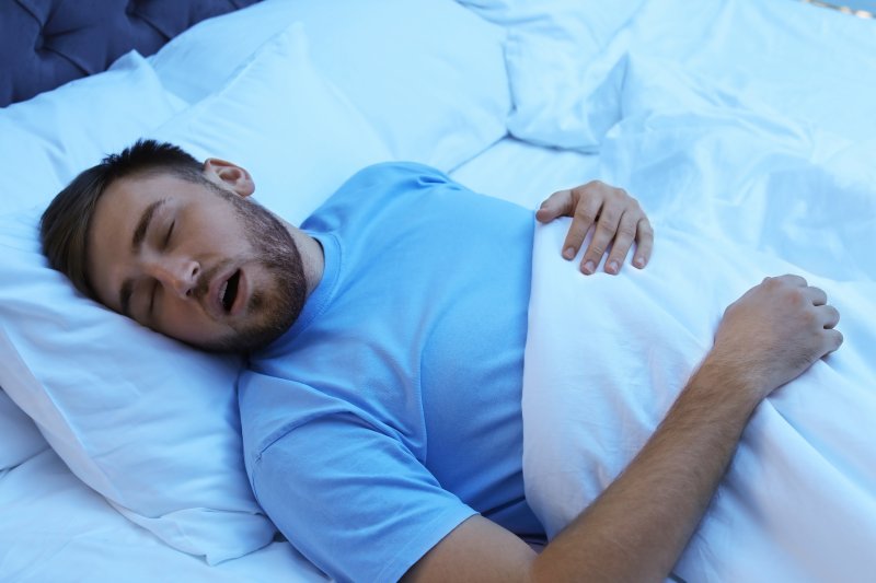 A man with sleep apnea sleeping on his back